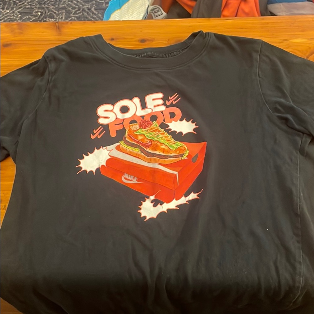 Nike Black Graphic Tee with Red Design